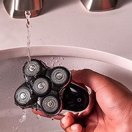 Balder unit getting cleaned under running water